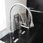 Goccia Basin Mixer with Spout on display